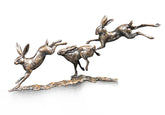Three Hares running