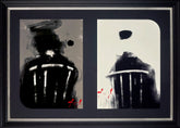 Framed artwork with two black and white abstract figures on a dark background
