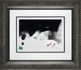 Framed black and white artwork with a signature in the corner