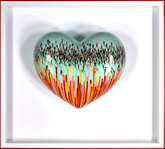Heart-shaped 3D artwork with colourful design and people figures on a white background