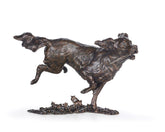Bronze sculpture of a dog on a white background