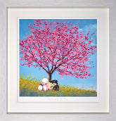 Framed artwork of three cartoon characters under a pink cherry blossom tree with a blue sky.