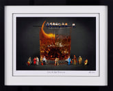 Framed artwork of a cocktail with miniature figures on a dark background