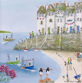 A colorful coastal village painting showing white seaside buildings on a cliff, small boats on the water, a sandy beach, and people walking and fishing. The artwork fills the frame, with no separate product background visible.