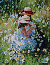 Two girls in hats sitting among flowers in a field
