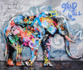 Colorful graffiti-style elephant painting on a textured wall with 'Stand Tall' text.