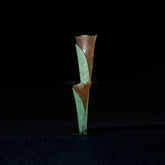 steams a bronze sculpture mixing bronze and green colours