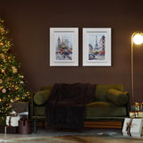 Living room with a Christmas tree, green sofa, and framed cityscape pictures on a brown wall.