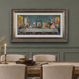 Framed artwork on green wall above dining table