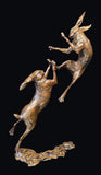 Bronze sculpture of two leaping Hares Boxing