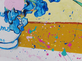 pink,yellow and green iris flowers in a white and blue vase with the text follow your dreams, vincent, set against a yellow background with paint splatters.