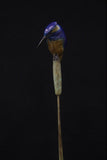 Bronze sculpture of kingfisher on fine branch