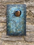 Bronze wall sculpture of kingfisher on plaque