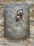 Bronze sculpture plaque of two sparrows