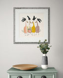 Framed artwork of colorful birds on a wall above a green cabinet with decorative items.
