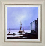 Framed artwork of a harbor scene with boats and buildings.