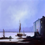Harbor scene with boats and buildings under a misty sky