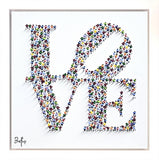 Colorful 'BE' artwork with a white background
