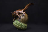 Bronze sculpture of acorn & squirrel