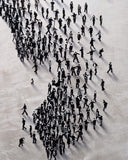 People arranged in a pattern on a textured surface