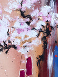Abstract art with splashes of pink, white, black, and gold on a textured background.
