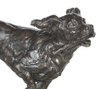 Bronze sculpture of a dog on a white background