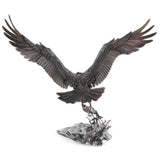 Statue of an eagle with outstretched wings on a white background