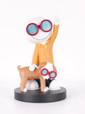 A stylized figurine of a white cartoon character wearing red-rimmed blue-tinted glasses and an orange shirt, standing behind a small brown dog in matching glasses, all mounted on a round black base against a white background.