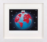 Framed artwork of a cartoon character standing on a red and blue world map with hearts.