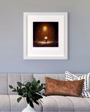 A framed art print depicting a whimsical glowing mushroom under a starry sky, displayed on a light gray wall above a modern gray sofa with decorative pillows and a plant.