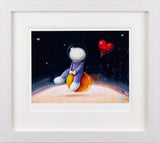 Framed artwork of a character on the moon with a heart-shaped balloon against a starry night sky.