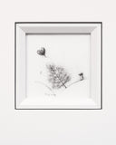 Framed black and white artwork of a tree and heart-shaped balloon on a white background