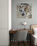 Modern interior with a desk, chair, and abstract horse painting on the wall.