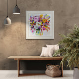 Living room interior with a floral painting on the wall, wooden bench, and decorative items.