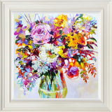 Colorful floral painting in a white frame