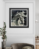 Framed artwork of a horse head on a wall in a room with a plant and chair.