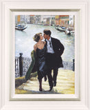 Framed artwork of a couple embracing by a canal with gondolas.