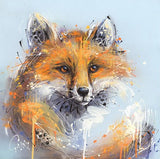 Framed artwork of a colorful fox on a light blue background