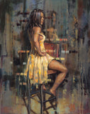 A woman with long dark hair sitting on a stool, wearing a yellow dress, set against a textured
