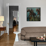 Living room with a brown sofa, coffee table, and a painting of two figures on a horse.