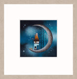 A framed art print featuring a whimsical illustration of a small house with an orange roof perched on a crescent moon against a starry blue night sky.