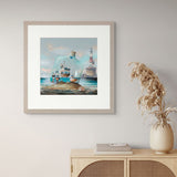 Framed artwork of a lighthouse and ship in a bottle on a wall above a cabinet.