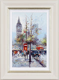 Framed artwork of a city street scene with Big Ben, red phone booth, and people walking.