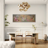 pink and white flowers with red butterfly on bronze background with white narrow frame against white background above wooden kitchen table.