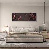 Modern bedroom with a bed, nightstands, and wall art.