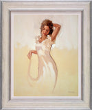 Framed artwork of a woman in a white dress against a yellow background