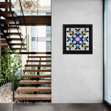 butterfly artwork on plain wall next to wooden modern staircase