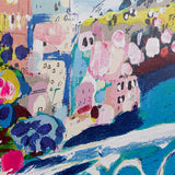 Colorful abstract painting of a coastal scene with buildings and flowers.