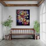 Colorful abstract painting on a wall above a wooden bench with plants on either side.