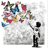 Illustration of a child releasing butterflies against a graffiti-covered wall.